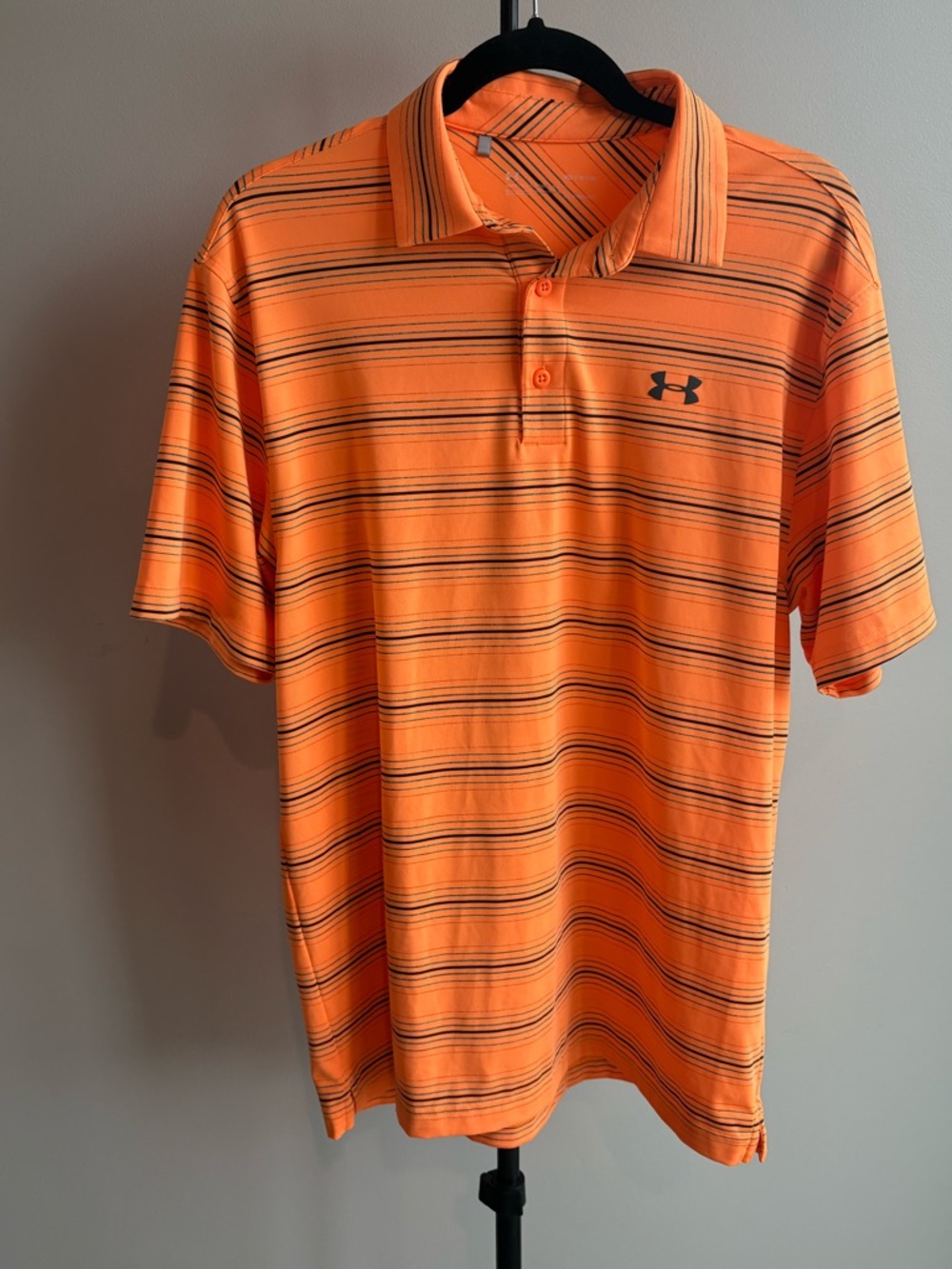 Under Armour Men’s Orange Striped Polo Shirt with Black Logo